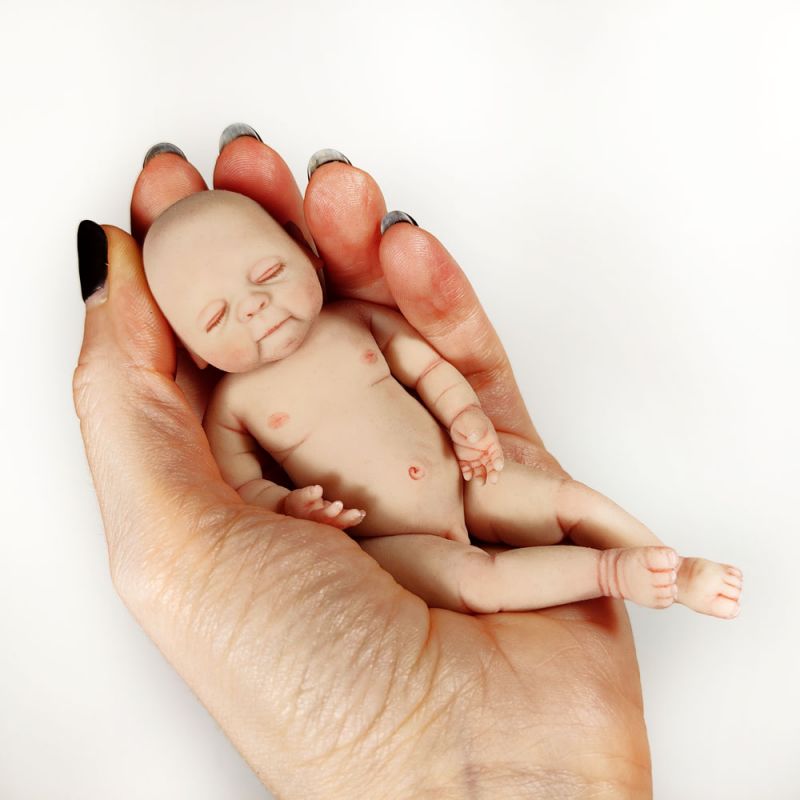 Solid silicone miniature sleeping baby Leo 11,6 cm (4,6")