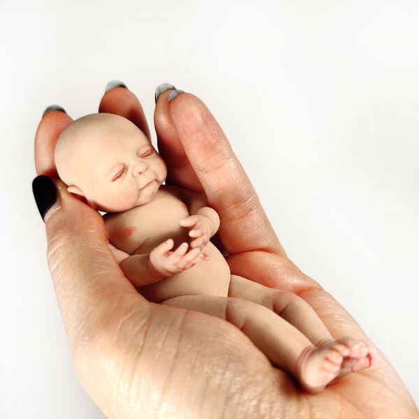 Solid silicone miniature sleeping baby Leo 11,6 cm (4,6")